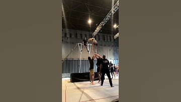 Circus Artists Perform Swings And Flips While Training - 1297216