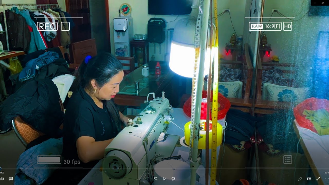 Snakify Tech My Aunt Sewing Clothes to Prepare for the Celebration of Lunar New Year ...