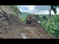 Unexpectedly cat d6r xl bulldozer pushes hard mountain soil to build roads