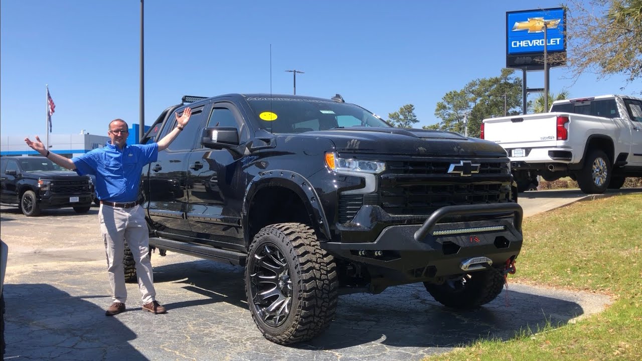 SOLD!!!!  Let’s talk about new lifted trucks! - American Luxury Coach & Rocky Ridge Silverados