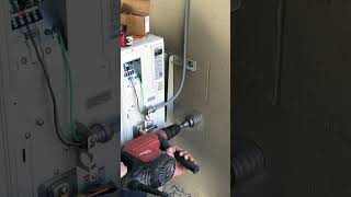 Coring through cement wall to install a mini split hilti TE60