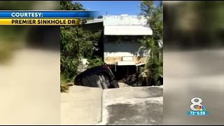 Sinkhole swallows car in Pasco, 6 families evacuated