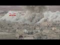لحظة رمي البراميل المتفجرة من