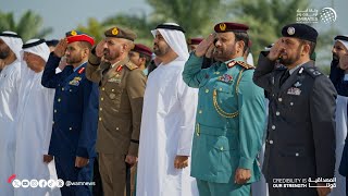 ذياب بن محمد بن زايد يرفع علم الدولة في واحة الكرامة احتفالاً بيوم العلم