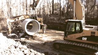 Laying 72 Inch Pipe with CAT 345cL and CAT 328DLcR