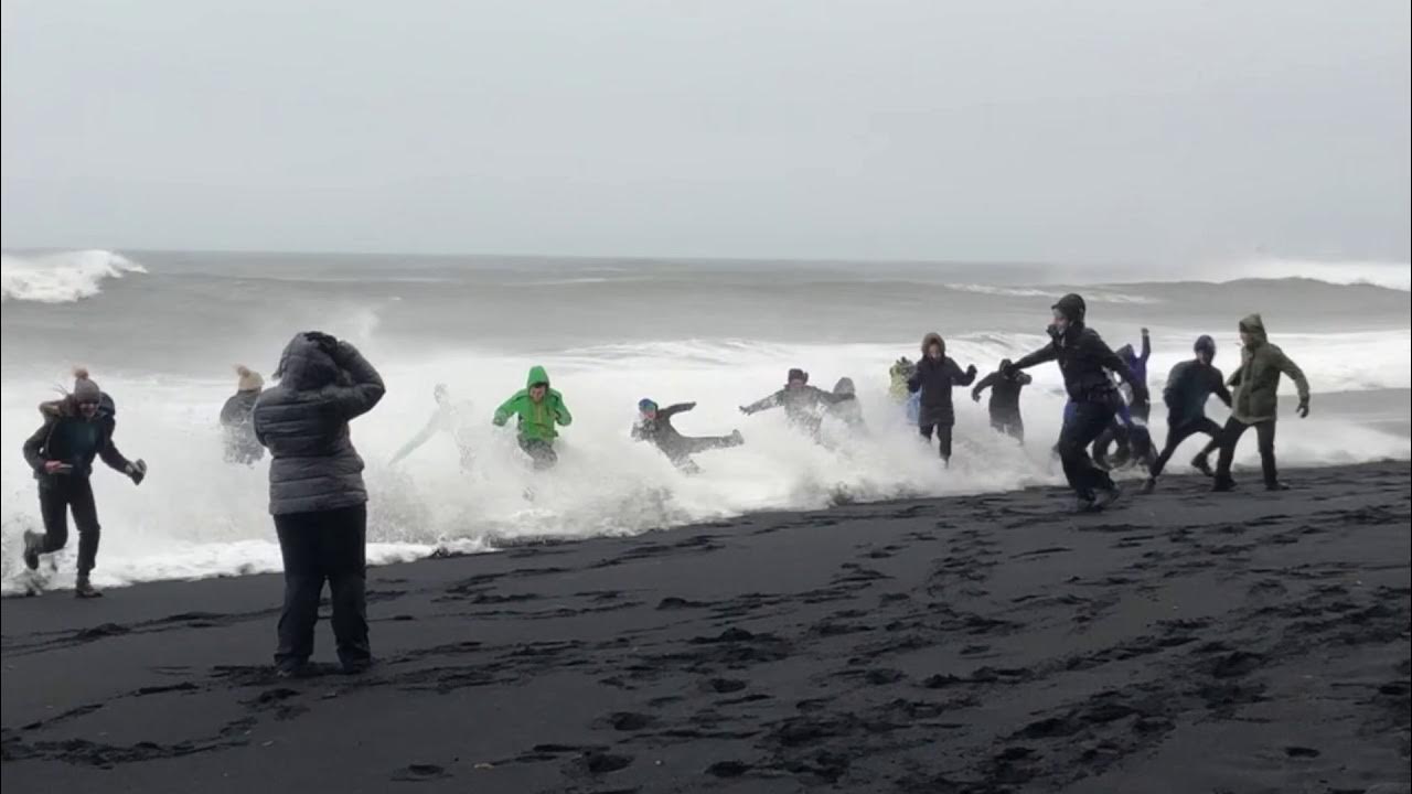 Waves Sneak Up Reynisfjara Beach in Iceland and Knock Over Tourists YouTube