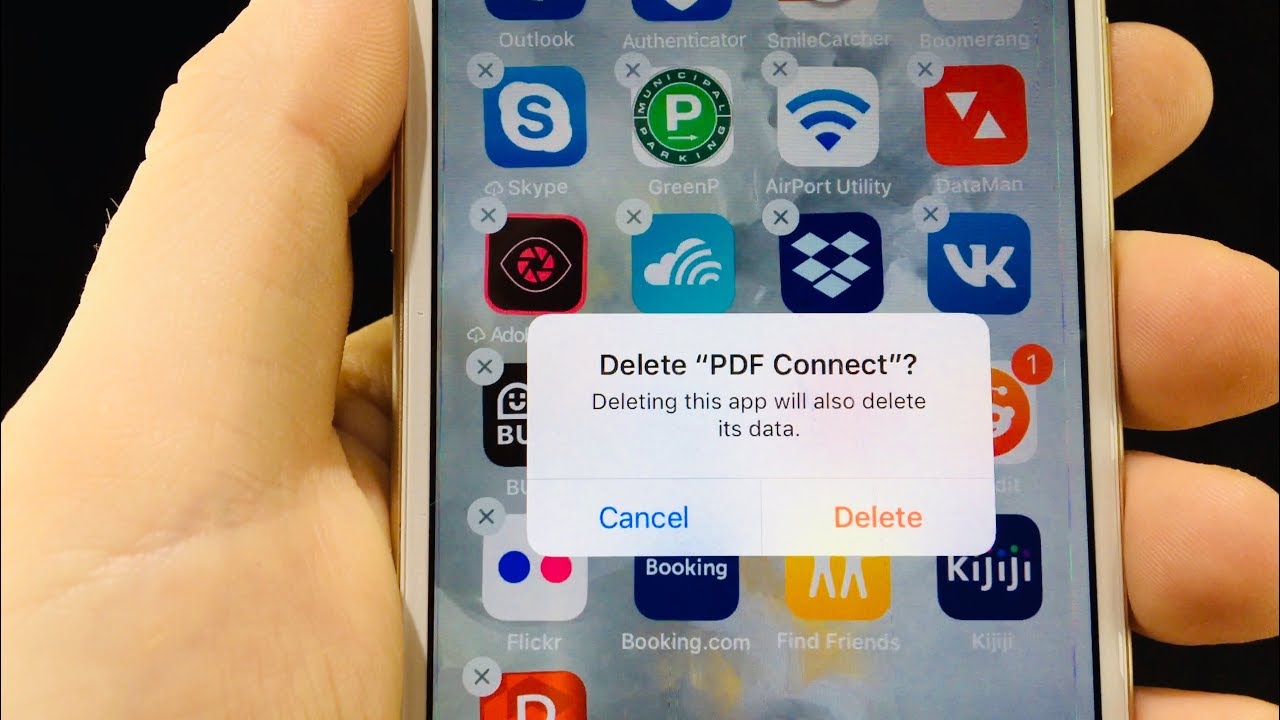 How do I permanently delete an app from my Apple account?