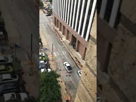 Raw video: Shooter attacks federal courthouse in Dallas