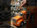 A small wooden machine, a model of an orange truck. #WoodCuttingMachine #WoodworkingTools #diy
