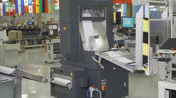 Pre-fold documents with the BlueCrest Cross Folder before traditional folding on in-line inserters.