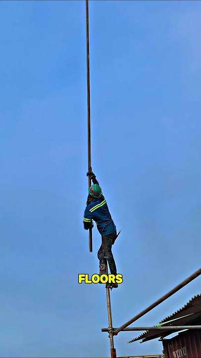 Download lagu They hang from buildings dozens of floors above the ground, assembling the platforms