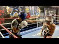 Intense sparring at the boxing gym