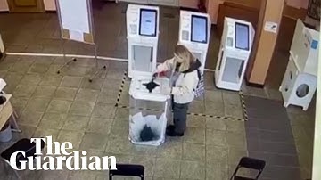 Russian woman detained after pouring dye into ballot box