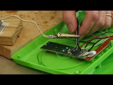 How to solder wires onto a circuit board when adapting a toy.