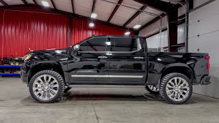 23 Chevy High Country with 4' lift on37s