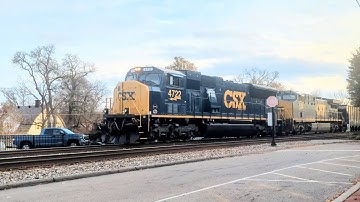 Northbound CSX E700 empty GALX coal hoppers with mid-train DPU, heading to loadout atNewell, PA 