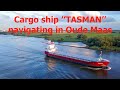 Cargo ship ''Tasman''and inland tanker''Company'' navigating in Oude Maas. Aerial video.