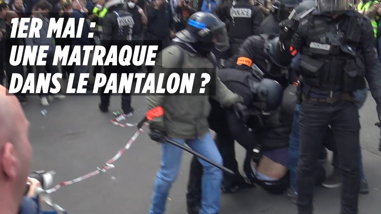 Policier Manifestant A Matraque Dans Il 1er MaiUn D'un Sa Pantalon Inséré Le T reBxodC