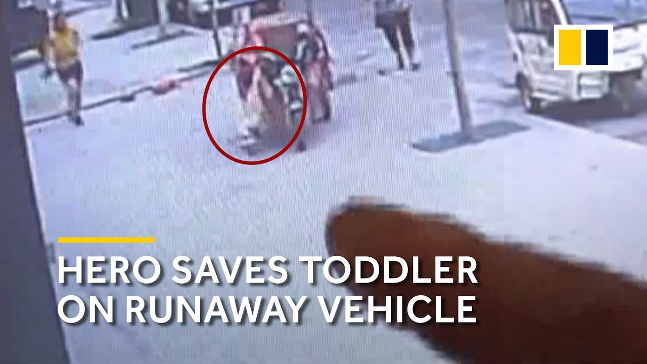 Chinese man uses body to stop runaway vehicle and save toddler - YouTube