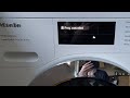 How to cancel the program on a Miele W1 washing machine