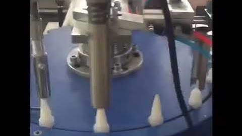 Automatic glue tube plug vibrating sorting feeding rotary filling plugging capping machine