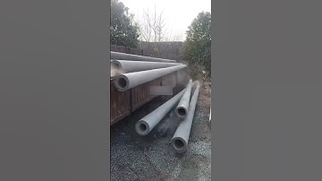 Unloading concrete electric pole