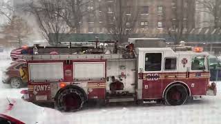 Engine 210 responding in heavy snow.