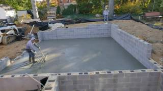 Timelapse of a concrete garage slab pour - 4K video