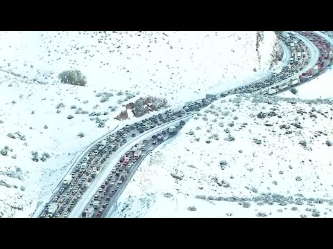 Skies clear, but snow snarls traffic in California