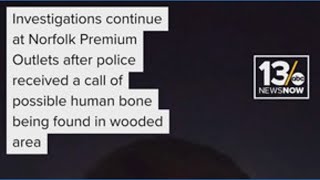 The investigation continues at Norfolk Premium Outlets after discovery of possible human bones