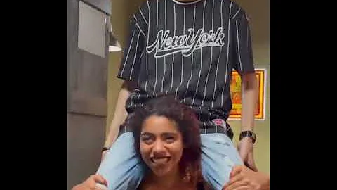 woman power lift carry man