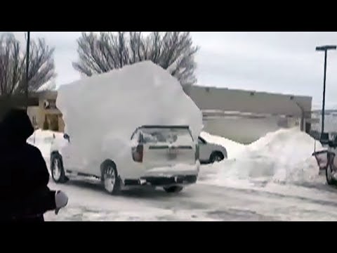 Bills players get back to Buffalo to find vehicles buried in snow