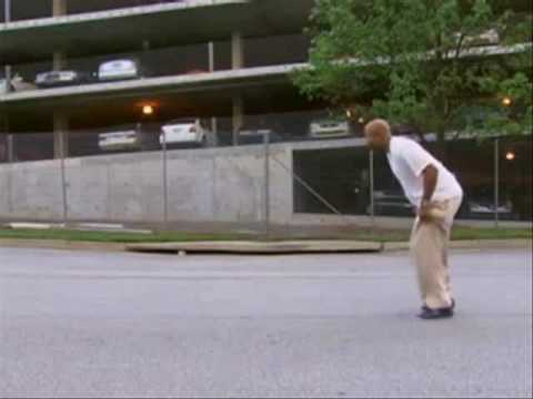 Kenny Smith trying to jump over a car to the tune ...