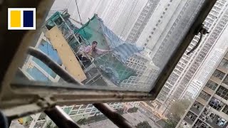 Hong Kong construction worker stranded in mid-air