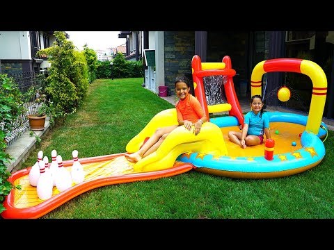 Öykü and Masal Play with Inflatable Water Slide - fun kids