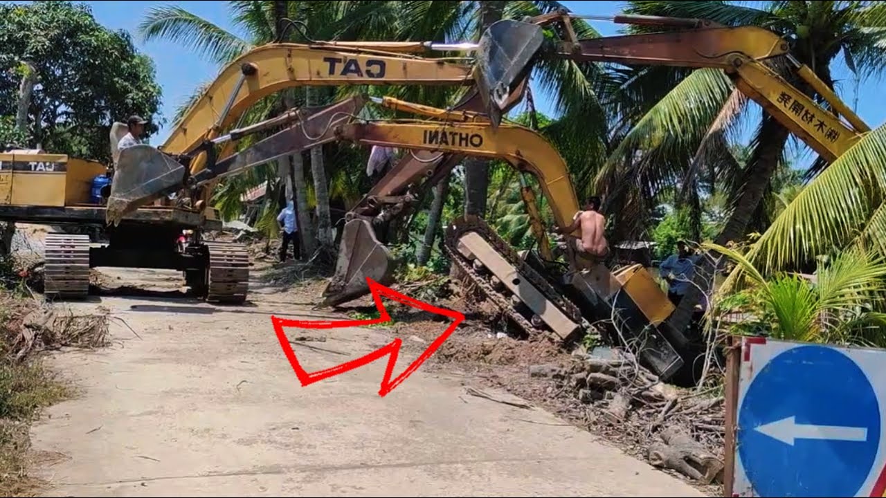 Epic Rescue: Excavator Falls Into the River!