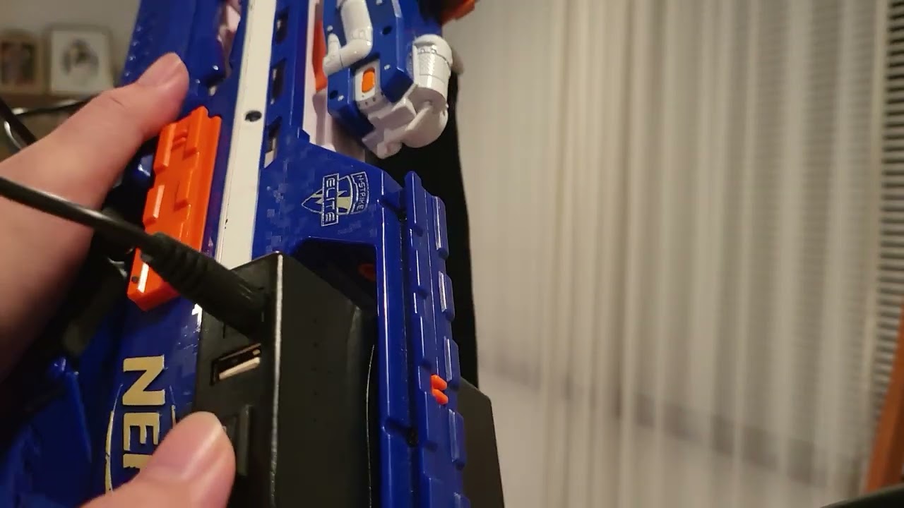 Nerf Rapidstrike Mod, stock internals powered by 12v Power bank.