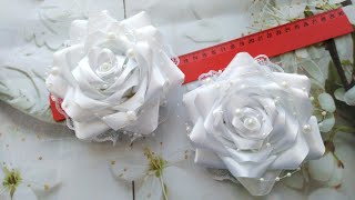 :       4  .   / Beautiful bows of satin ribbons