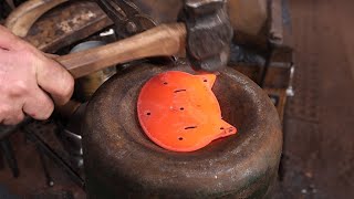 Forging cat head chest handles  Blacksmithing