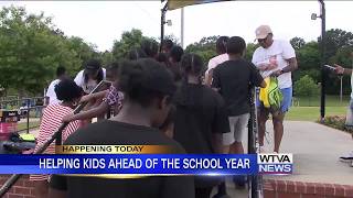 Tupelo man teams up to give away backpacks, school supplies