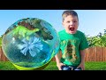 Giant dinosaur ice eggs  caleb  mommy melting ice balloons dinosaurs for kids fun activity