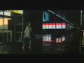 Woman in a rainstorm at an airport