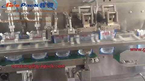Film formed doypack bag packing machine for liquid with slant spout