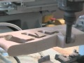 PADE - machining centre VELOX  - Working Gun Stock. Piece hold by center tail-stock (TST)