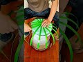 Hands weave simple strips into strong useful baskets