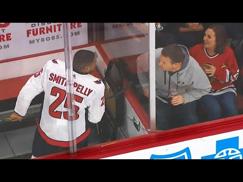 Fans get the boot after harassing Smith-Pelly in penalty box