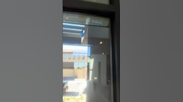 weather stripping/gasket warped at storefront glass adjacent to main door