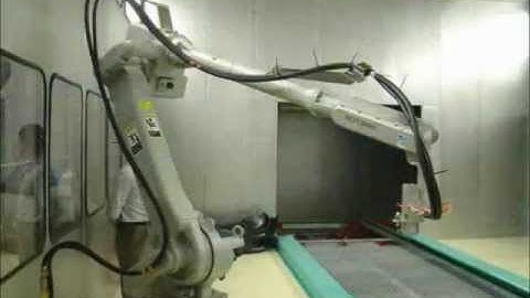 Motoman robot in flame treatment application