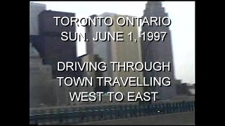 TORONTO, ONTARIO - SUNDAY JUNE 1, 1997. Driving Through Town Travelling West to East.