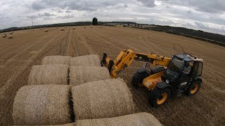 JCB and FENDT Stacking Round Bales
